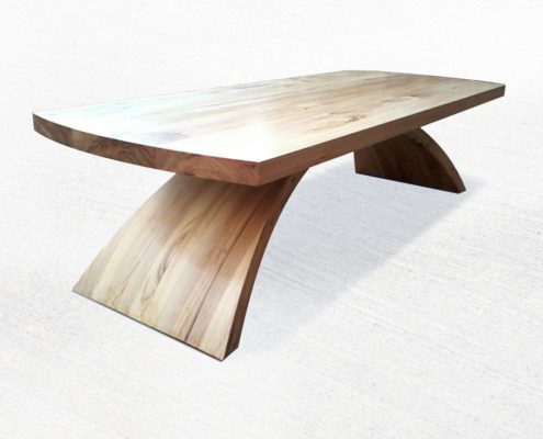 Ceeder wooden coffee table with curved base and top with ends curved