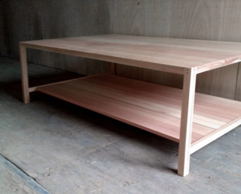 Wooden coffee table with simple linear aesthetic