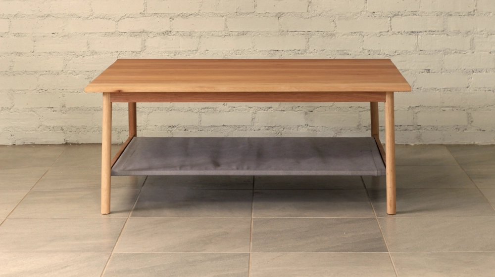 Eucalyptus grandis coffee table round section legs fabric shelf