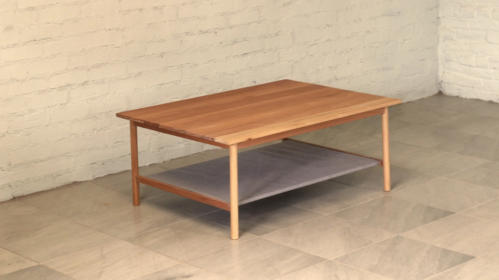 Eucalyptus grandis coffee table round section legs fabric shelf